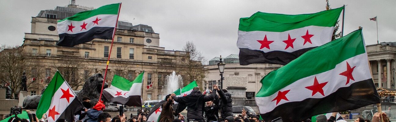 Syrian opposition supporters celebrate the fall of Damascus, Trafalgar Square, London 8th December 2024. Credit: Steve Eason